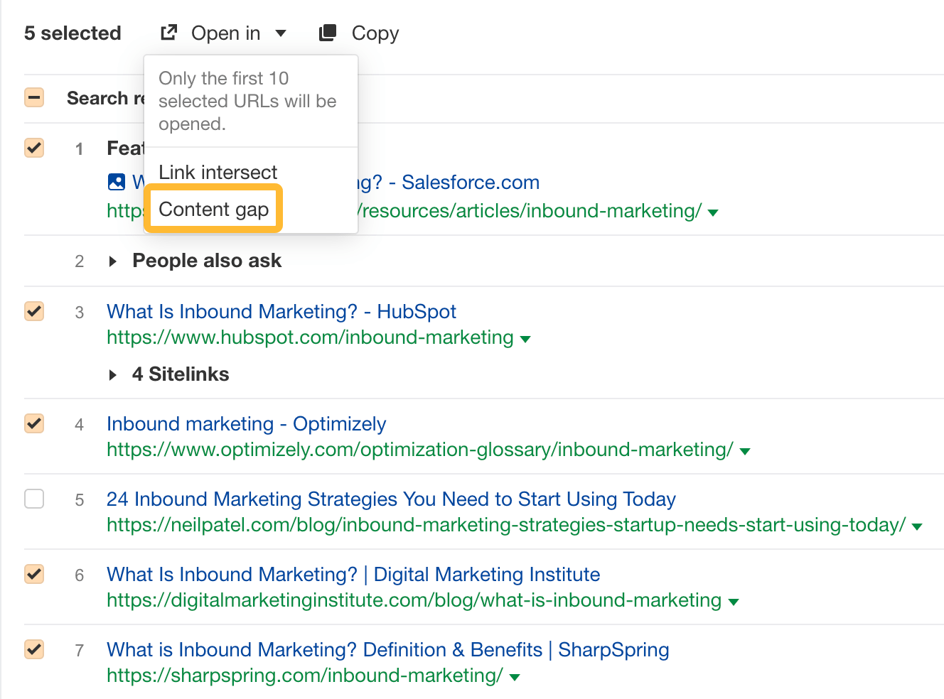 How to Write Website Content That Ranks (And People Want to Read) | Using the feature "Open in Content Gap" to see common keyword rankings, via Ahrefs' Keywords Explorer